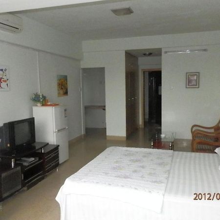 Xingfu Hotel Nanning Værelse billede