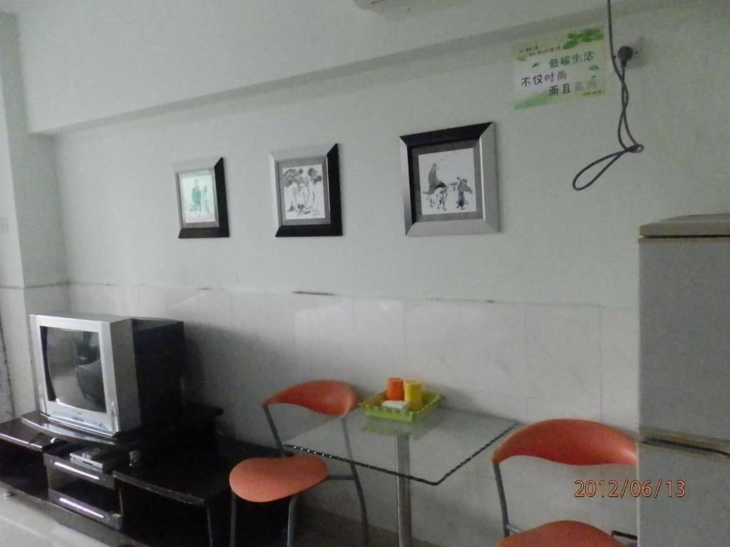 Xingfu Hotel Nanning Værelse billede