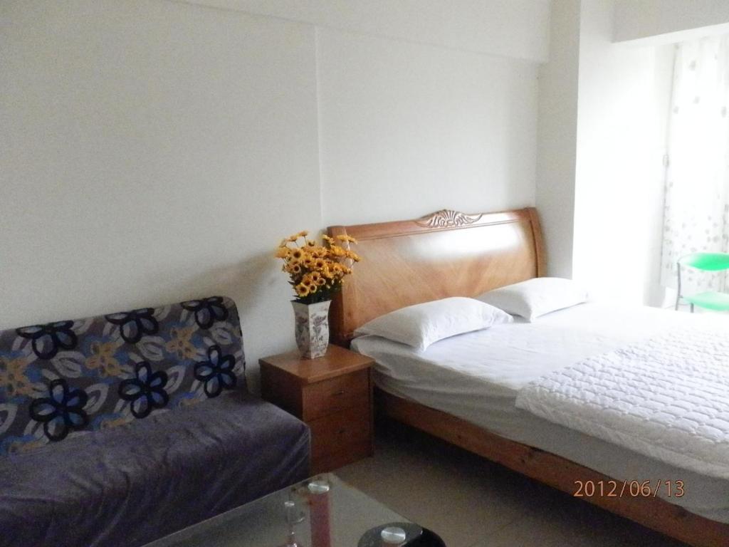 Xingfu Hotel Nanning Værelse billede